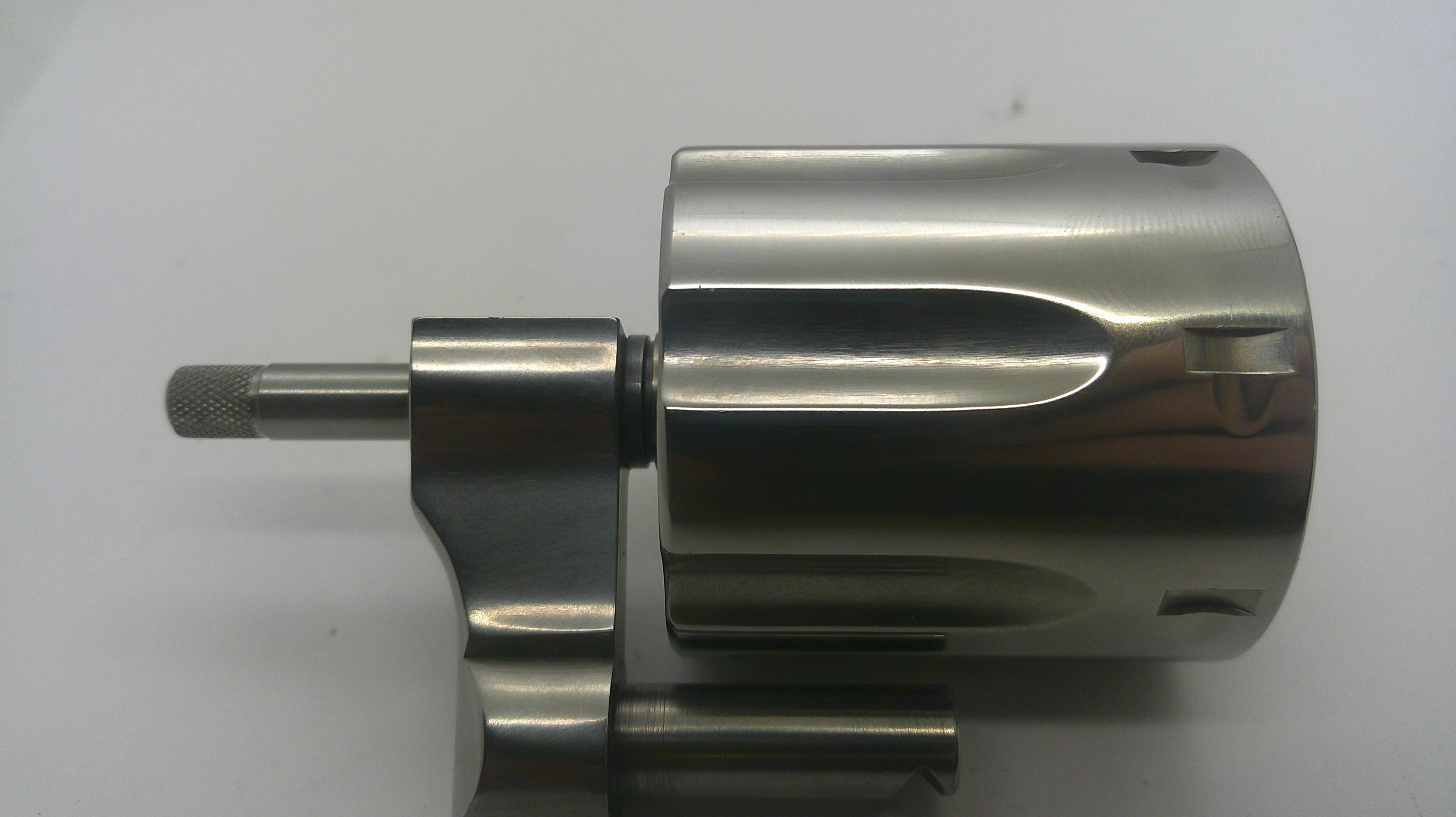 A machined metallic cylindrical component with a threaded shaft and mounting bracket, shown on a plain light background.
