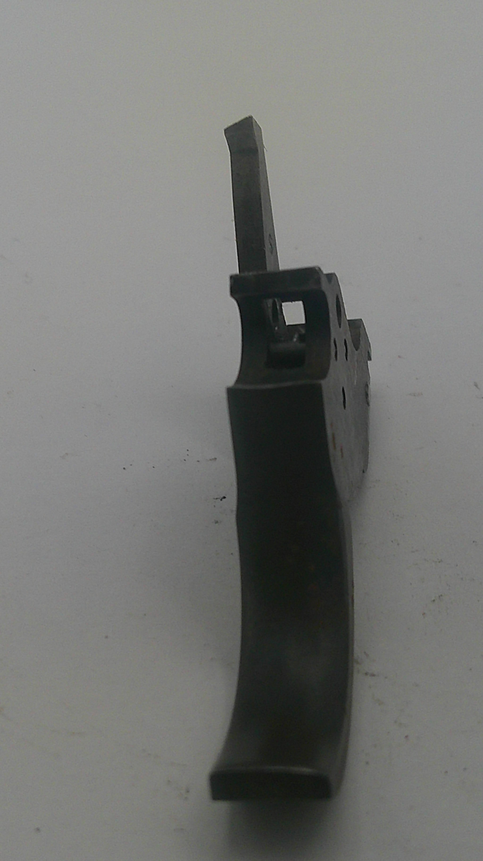 A black plastic replacement trigger assembly for a firearm, shown horizontally against a plain light gray background.