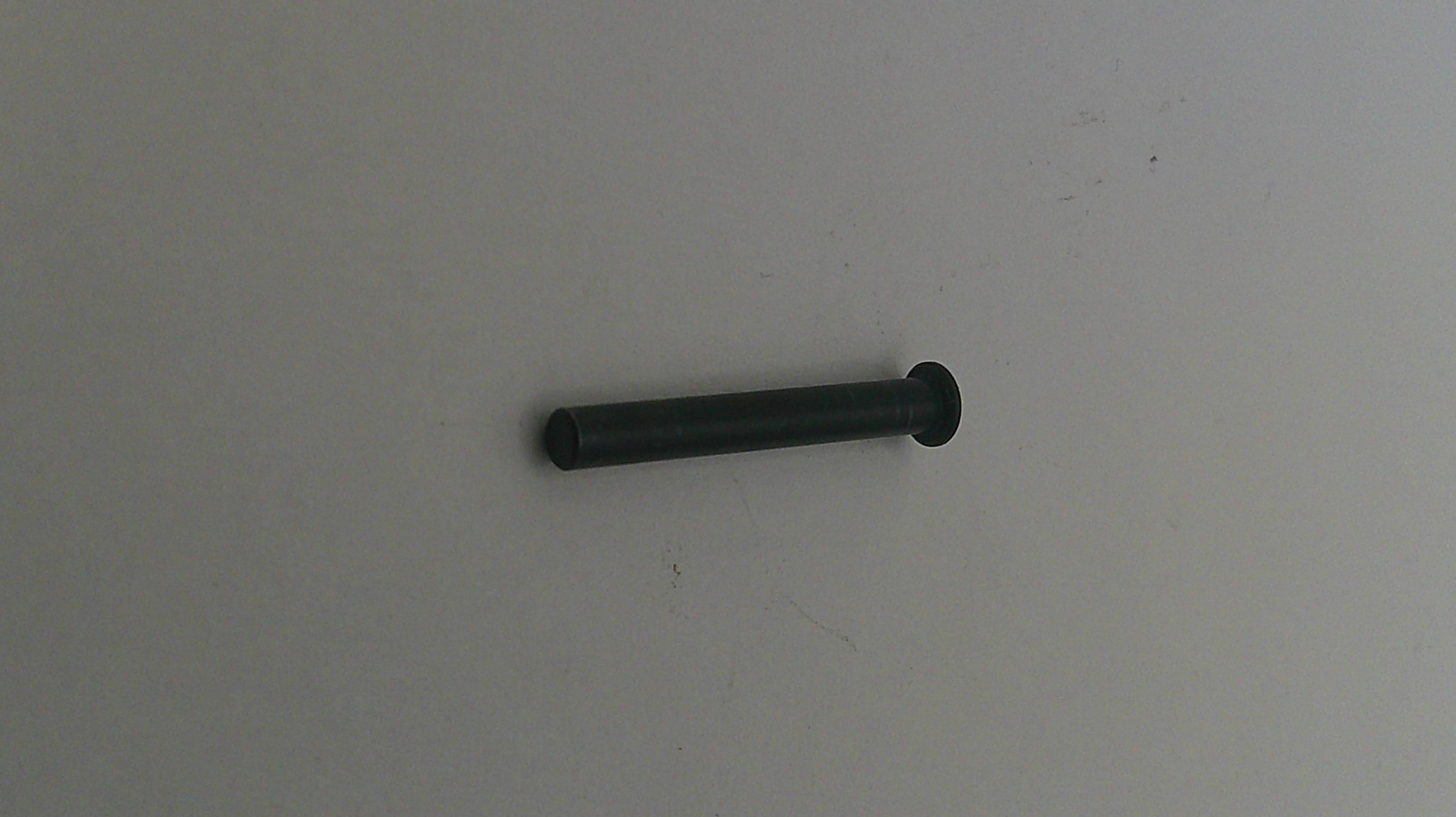 Black cylindrical object on a white background