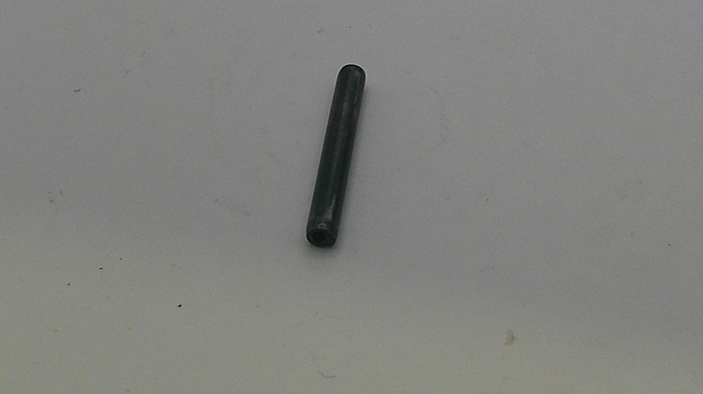 Black cylindrical object on a white background