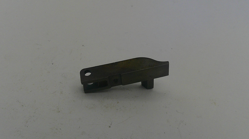 Metallic component on a light gray background