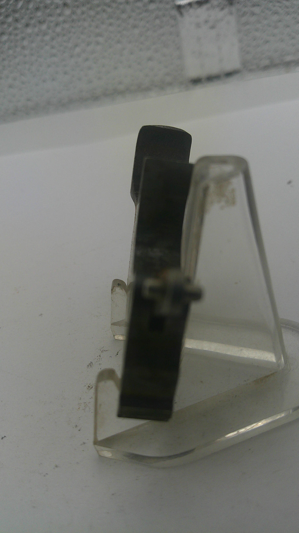 Metallic door handle on a white door