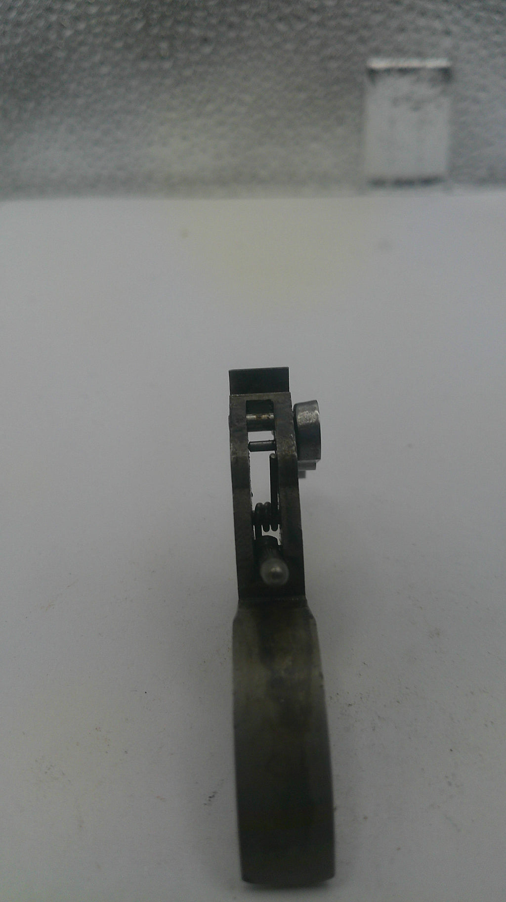 Metallic object on a white background