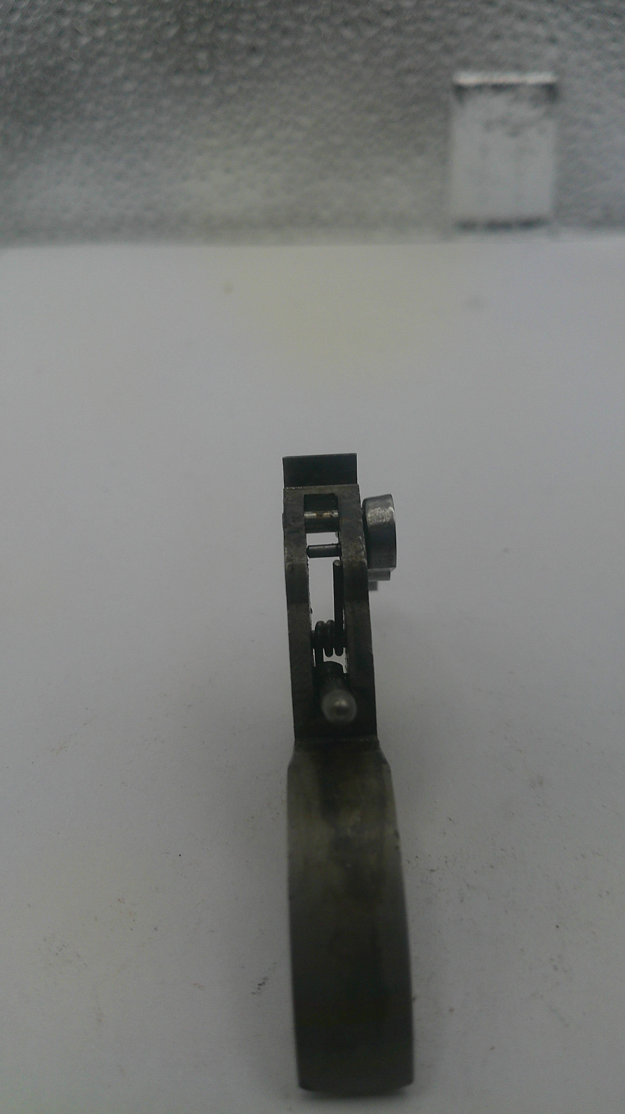 Metallic object on a white background