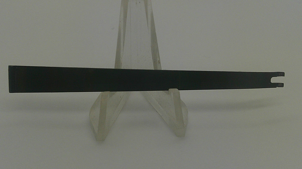 A long, narrow black metal pry bar or tool with a split tip, displayed horizontally on a clear plastic stand against a plain light background.