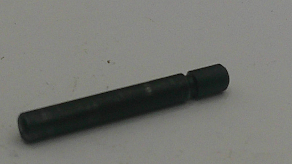 Black cylindrical object on a white background