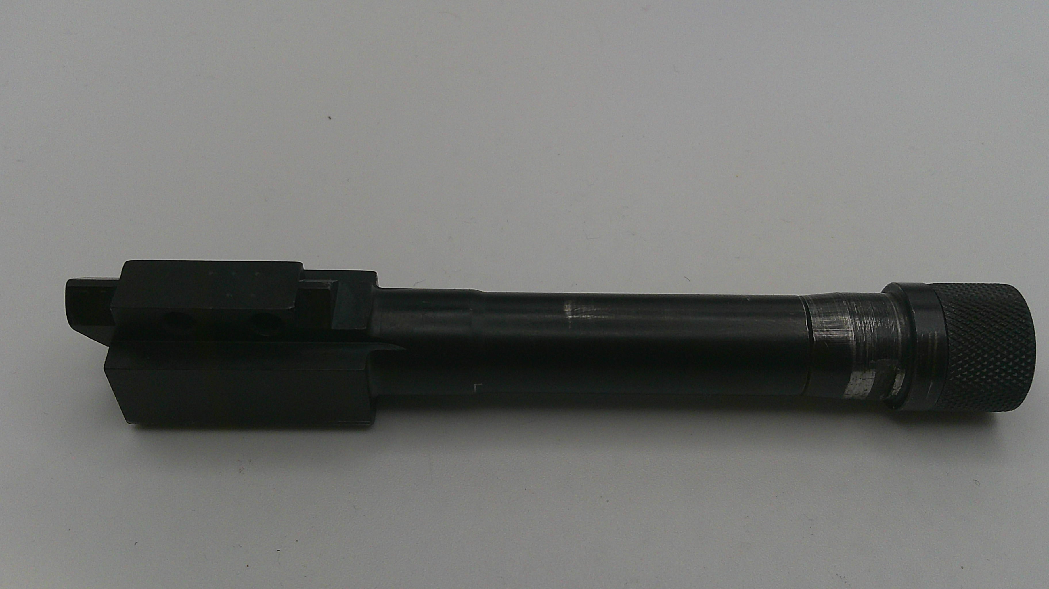 Black cylindrical tool on a white background