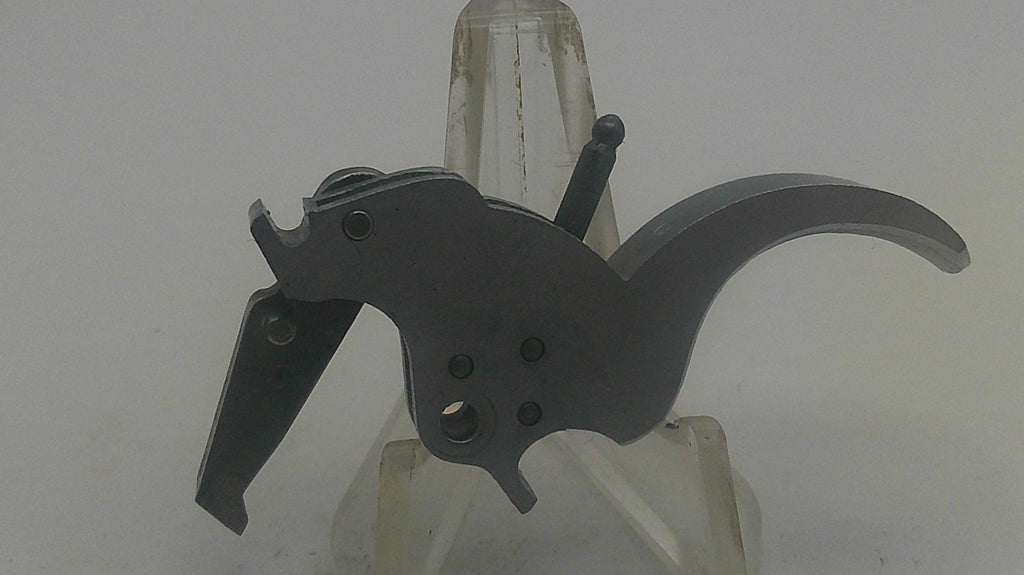 Black mechanical component on a white background