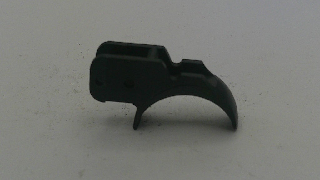 Black plastic component on a white background