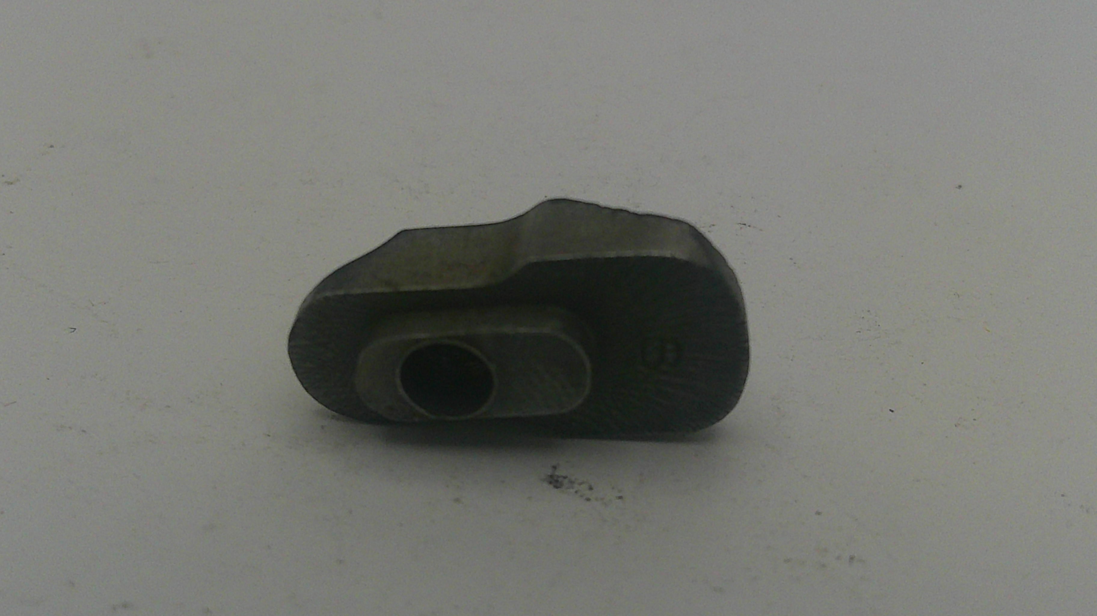 Metallic object on a white background