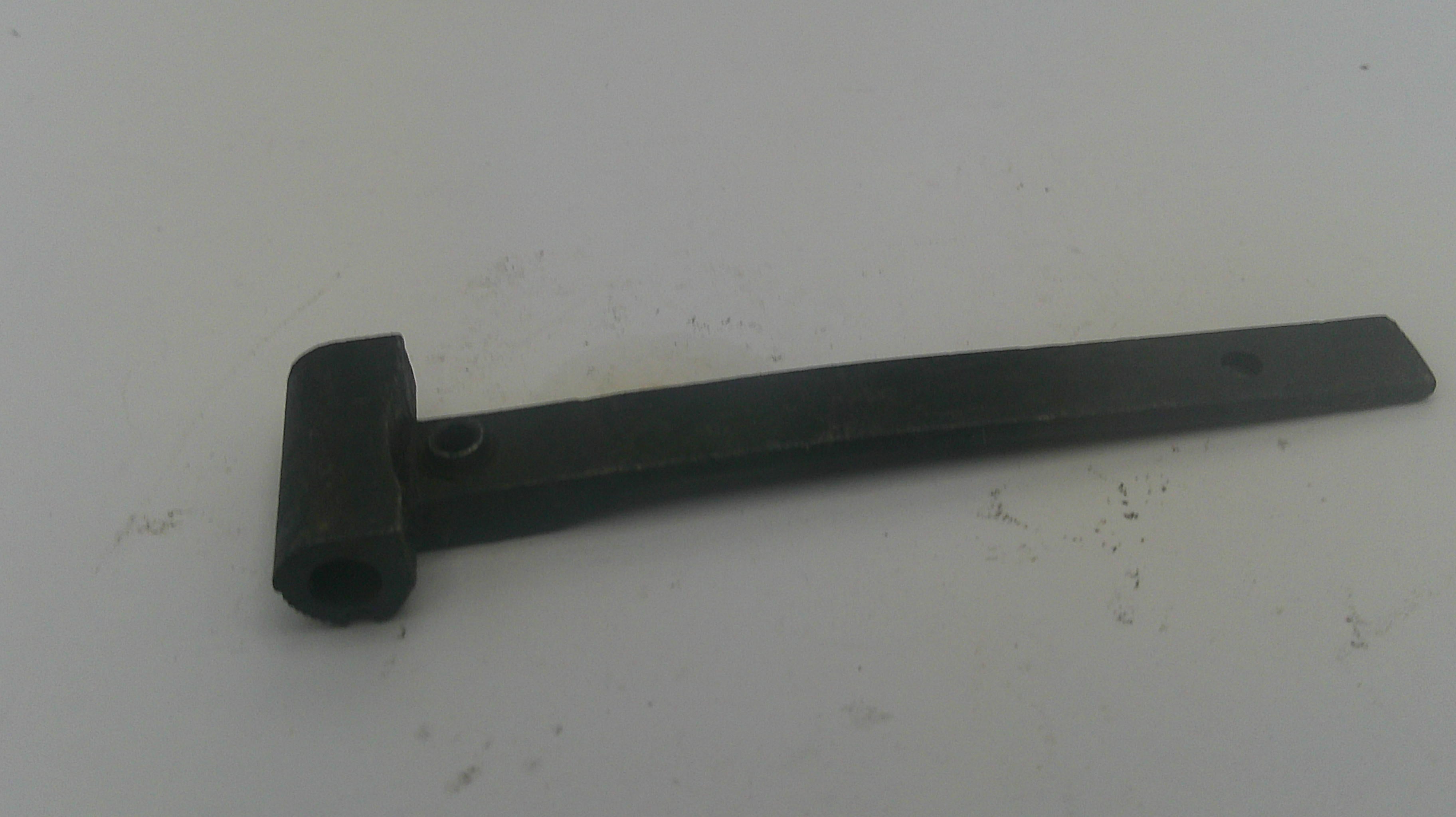 A black metal garden or lawn mower blade attachment with a mounting bolt, shown on a plain off-white background.