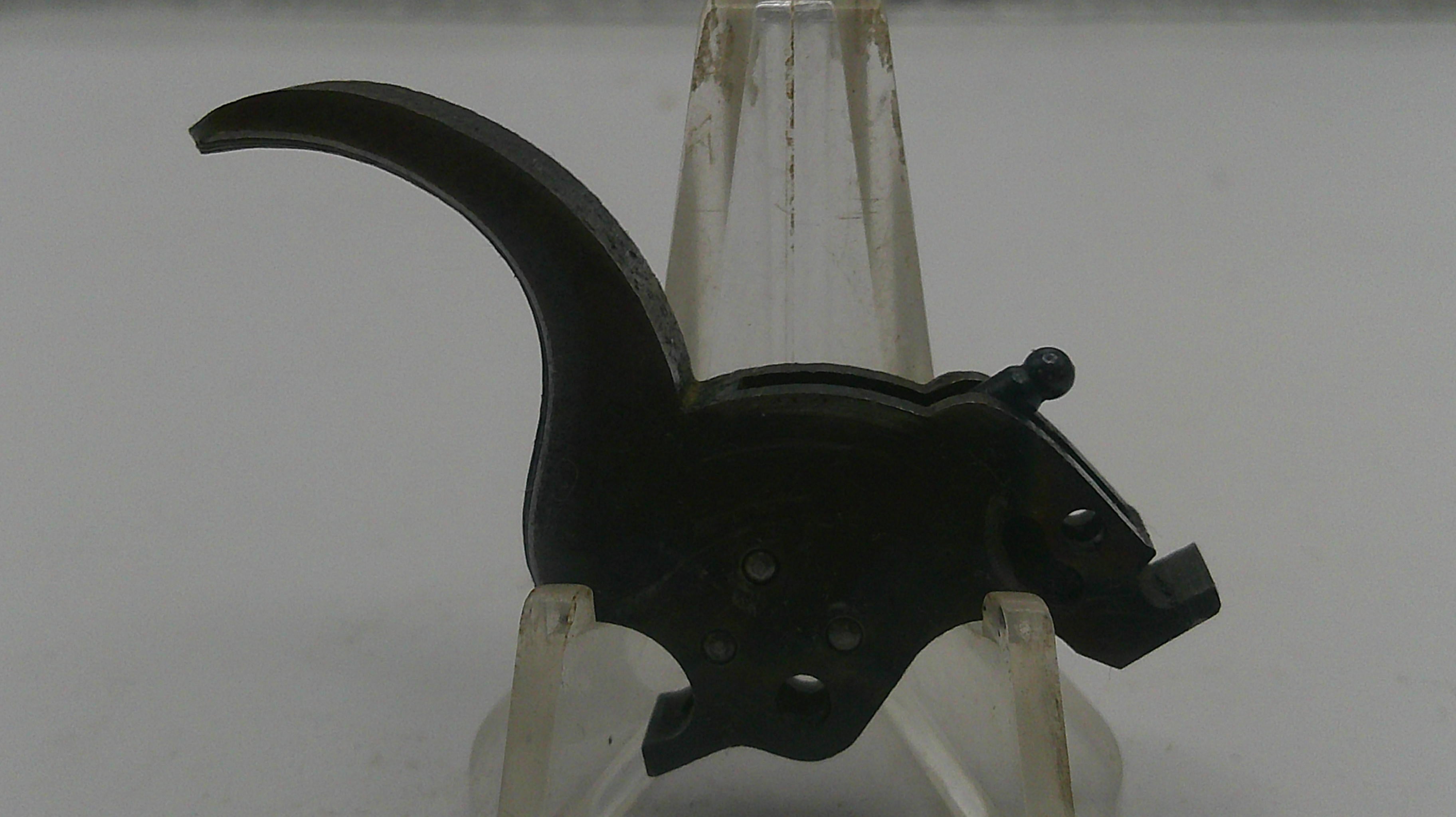 Black metal tool on a white background