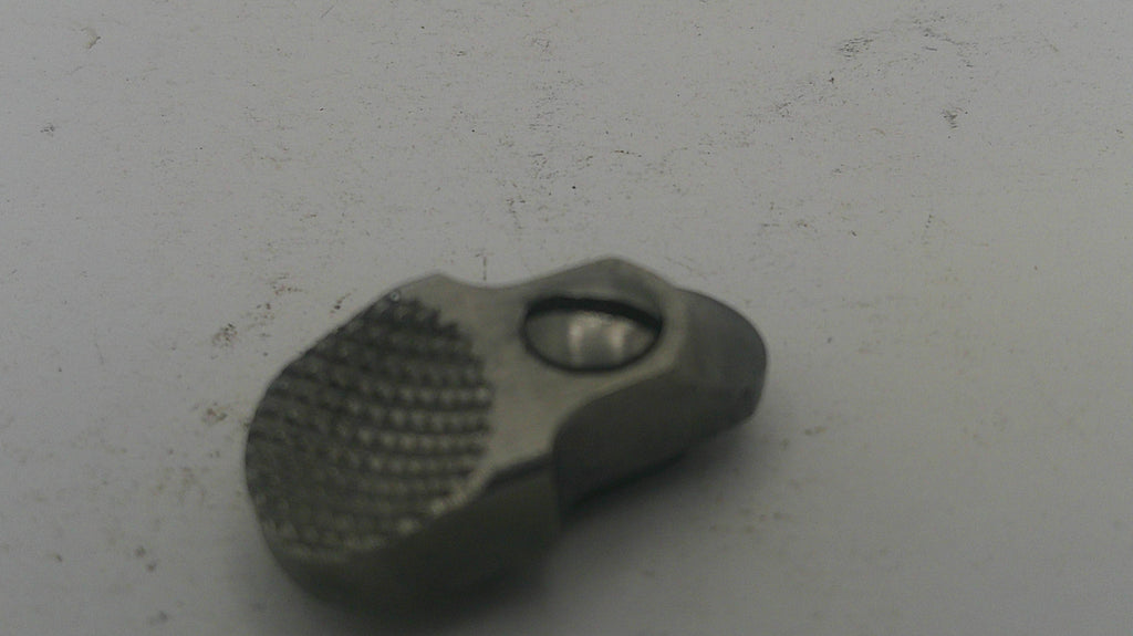 Metallic tool with textured surface on a white background