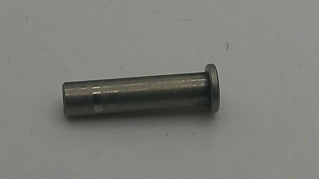Metal cylindrical object on a gray background