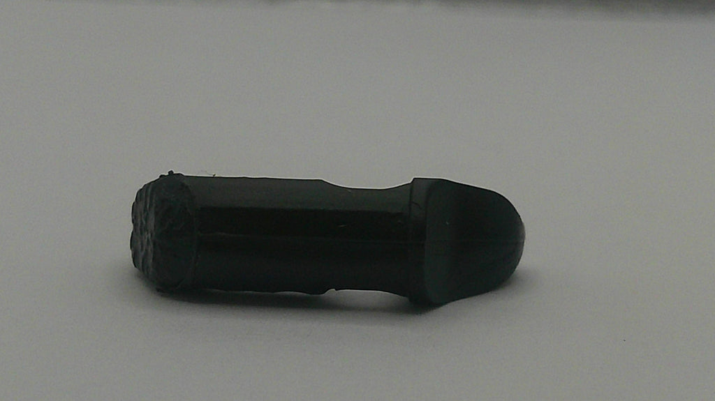 Black shoe on a light gray background