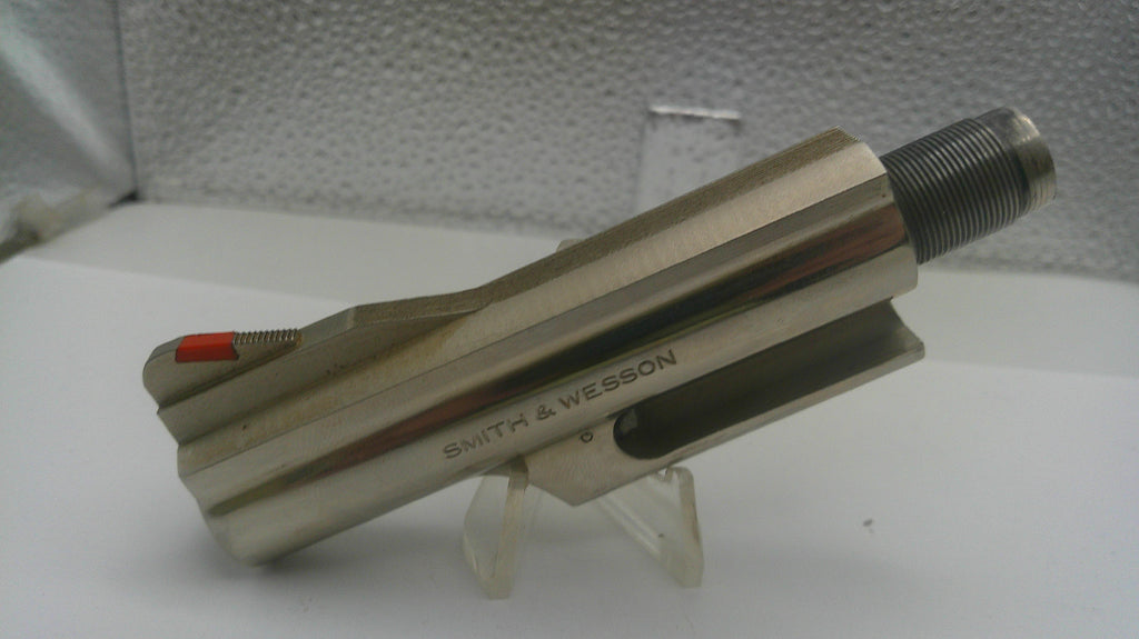 Smith & Wesson firearm barrel on a stand with a white background