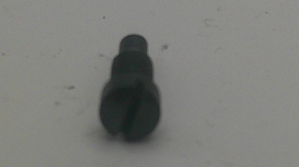 A small black plastic or metal cylindrical component with a split circular end, photographed on a plain light gray surface.