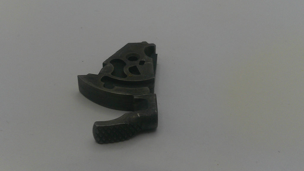 Black metal mechanical component on a white background