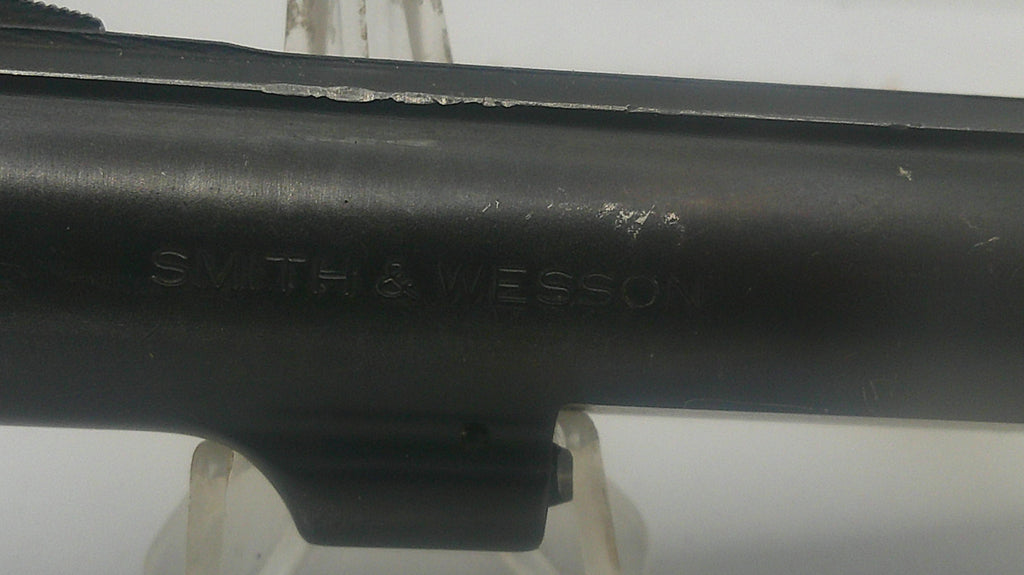 Black rifle stock with 'Smith & Wesson' engraving on a white background