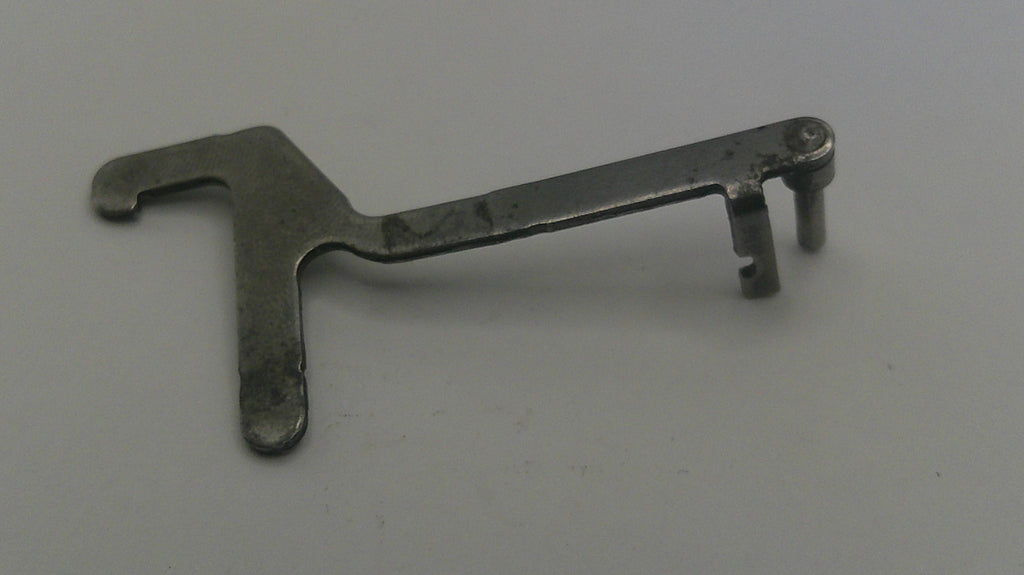 Metal tool on a gray background
