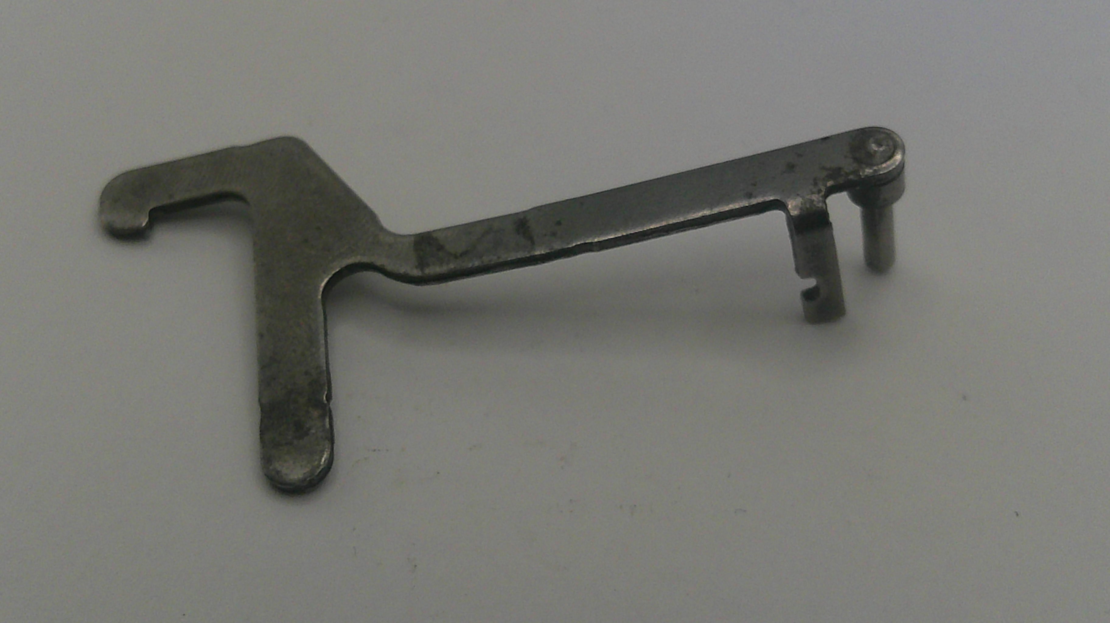 Metal tool on a gray background