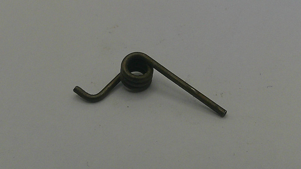 Metallic screw or fastener on a gray background
