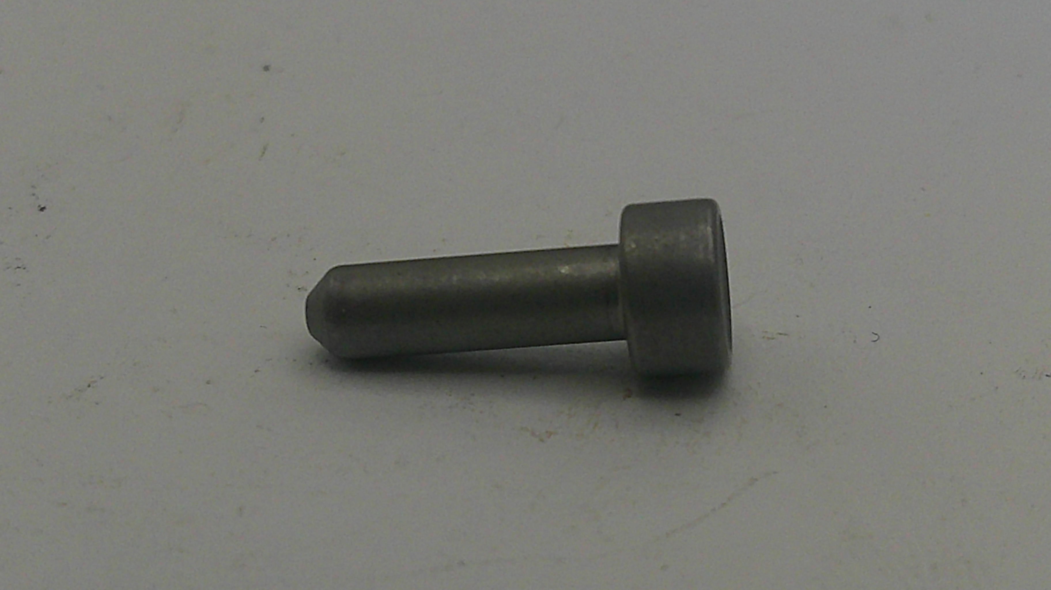 Metal bolt on a light gray background