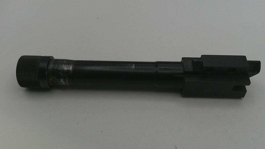 Black cylindrical object on a white background