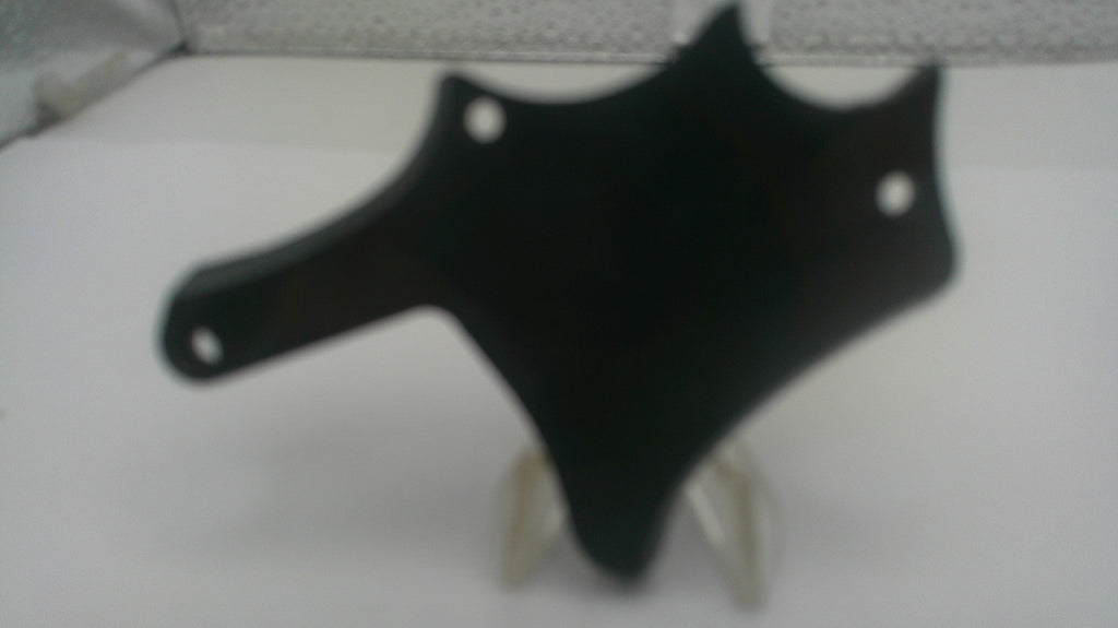 A black plastic motorcycle or scooter fairing cover with mounting holes, displayed on a clear stand against a white background.