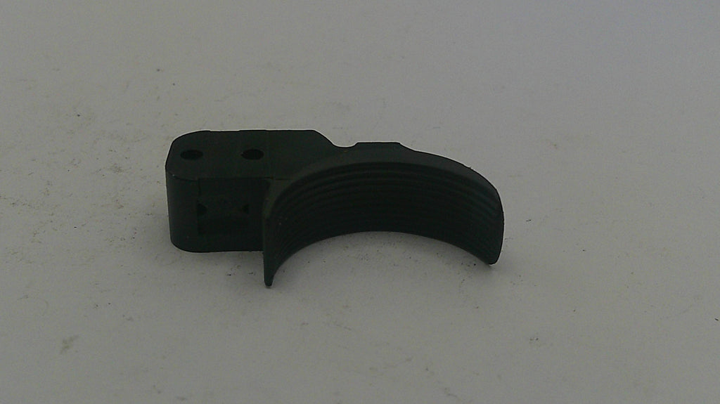 Black plastic component on a white background