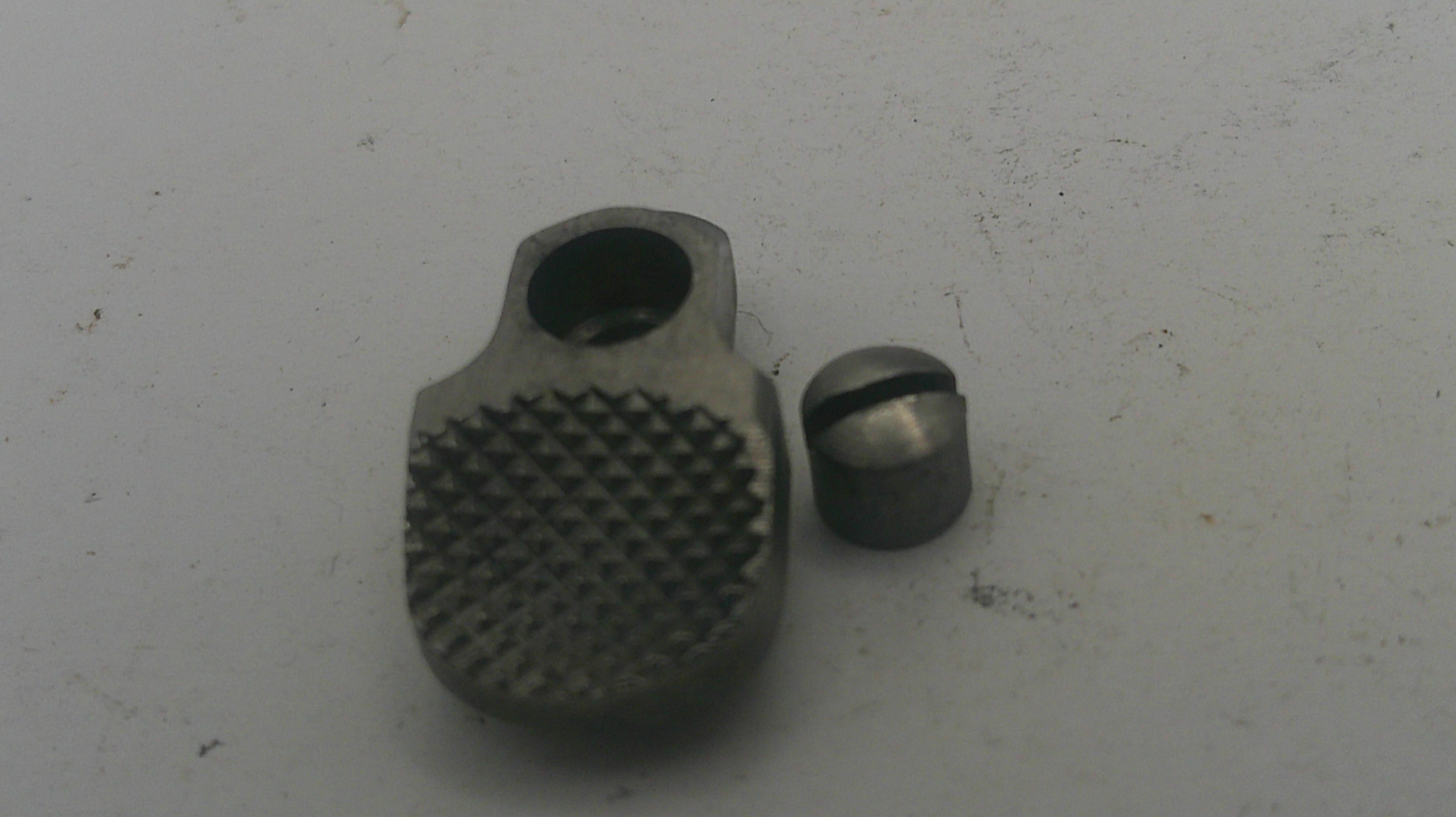 Two metal objects on a white background