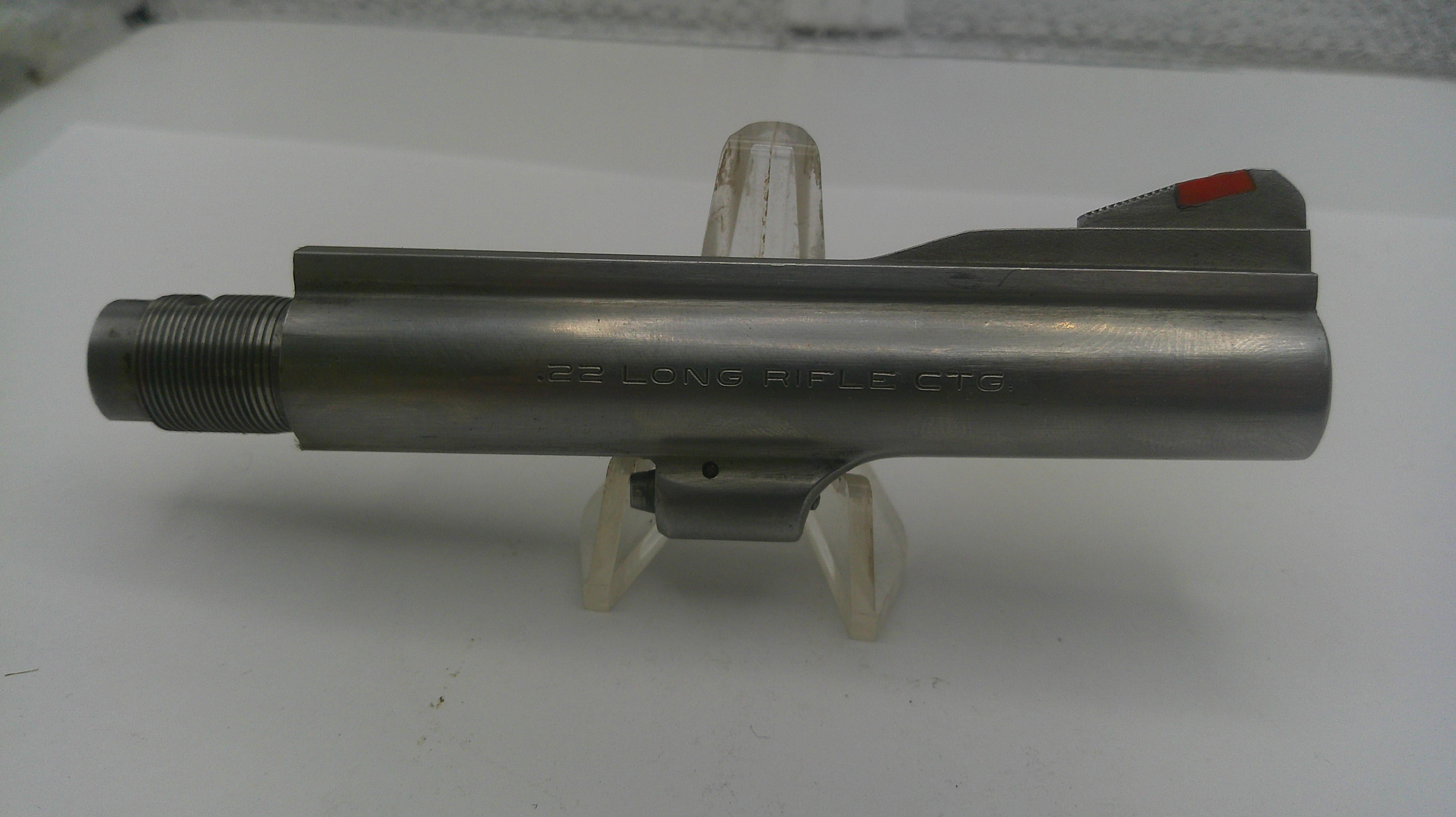 Metal component with 'HELLA' branding on a white background