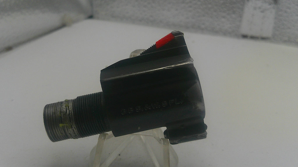Mechanical component with a red indicator on a white background