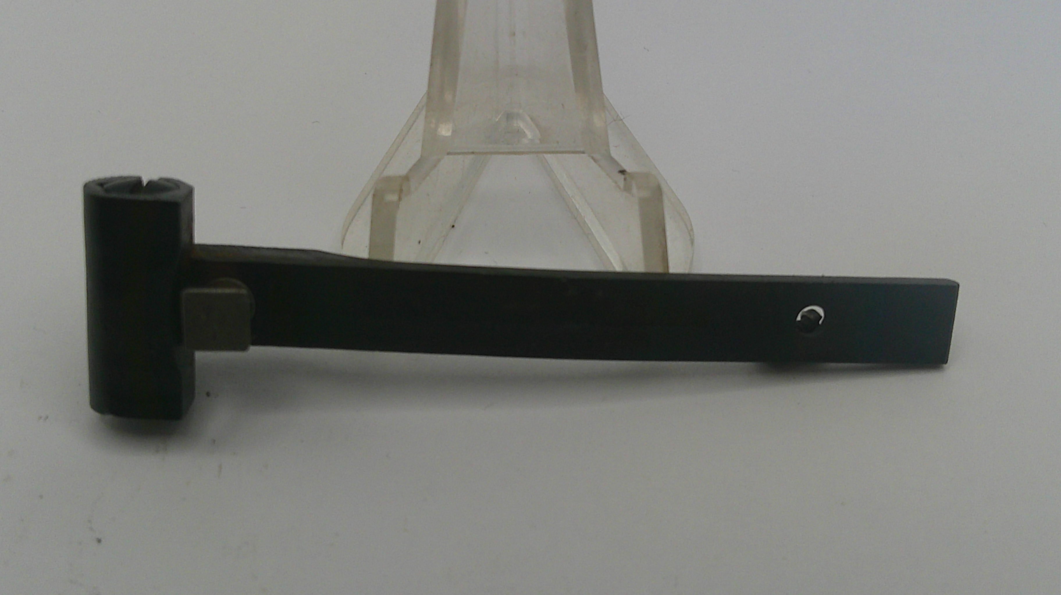 Black metal lever on a white background