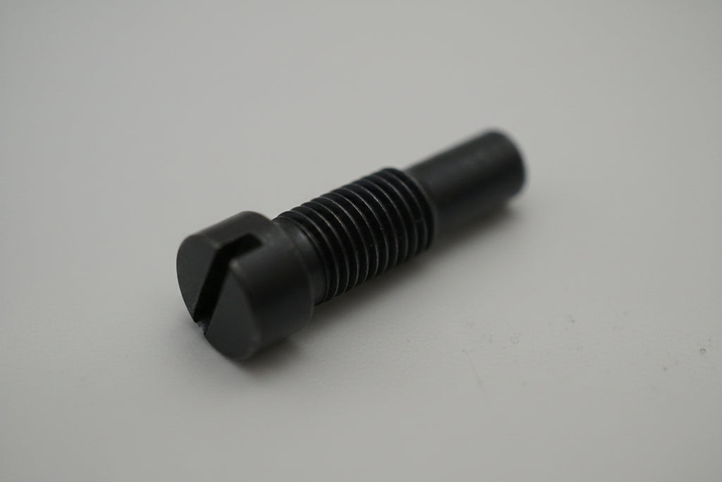 Black metal fitting on a light gray background