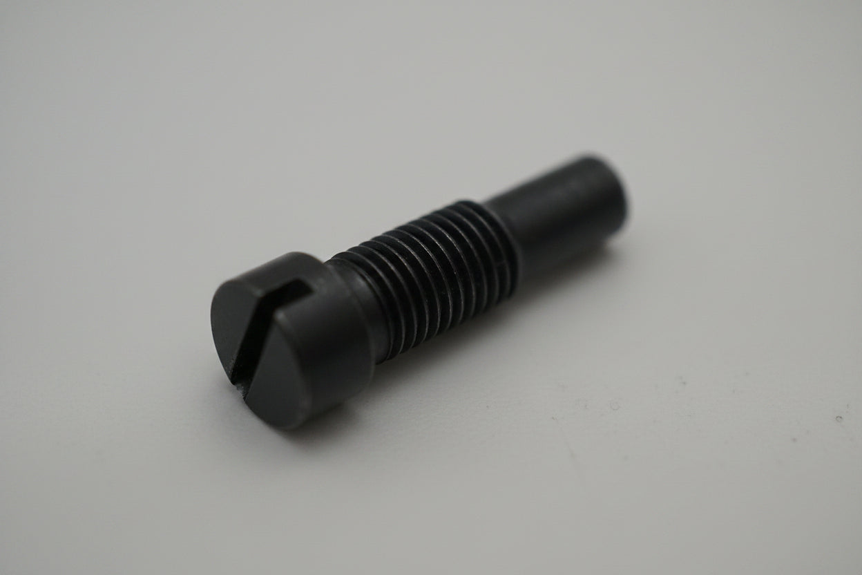 Black metal fitting on a light gray background