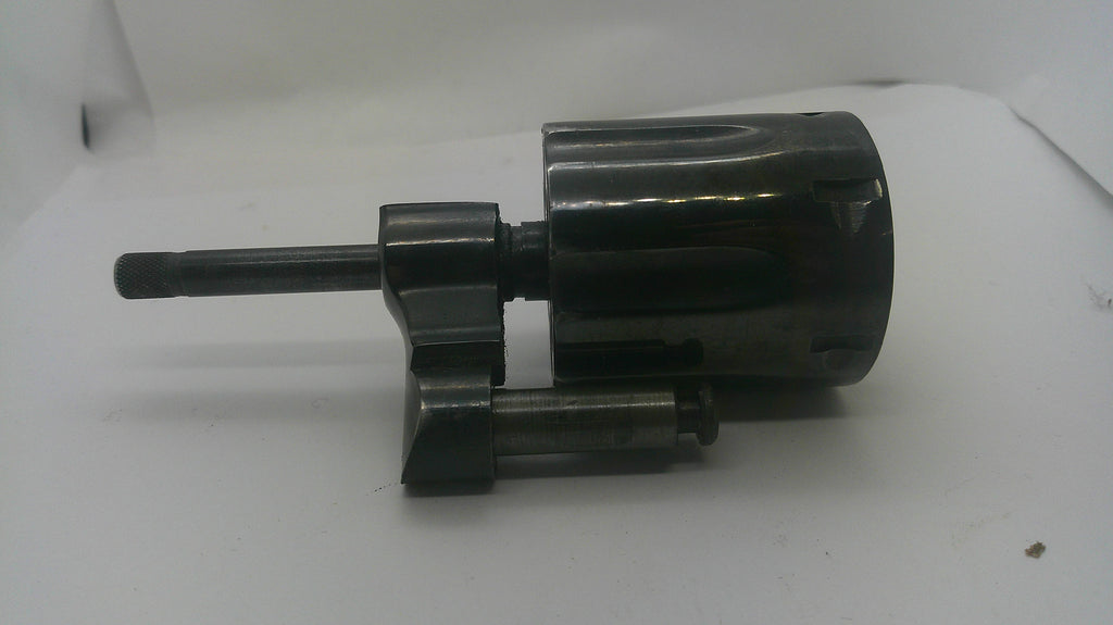 A black plastic and metal mechanical part, possibly a pump or motor assembly, photographed on a plain white background.