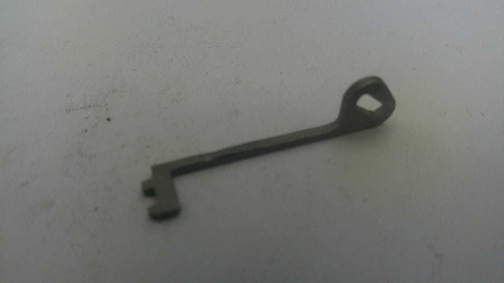 Vintage key on a light gray background