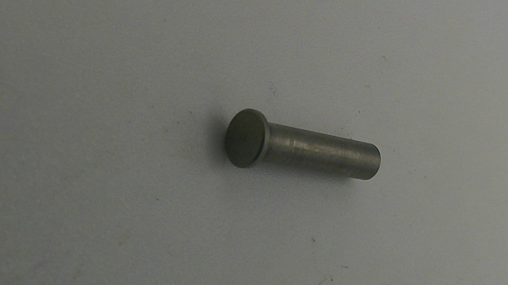 Metal cylindrical object on a gray background