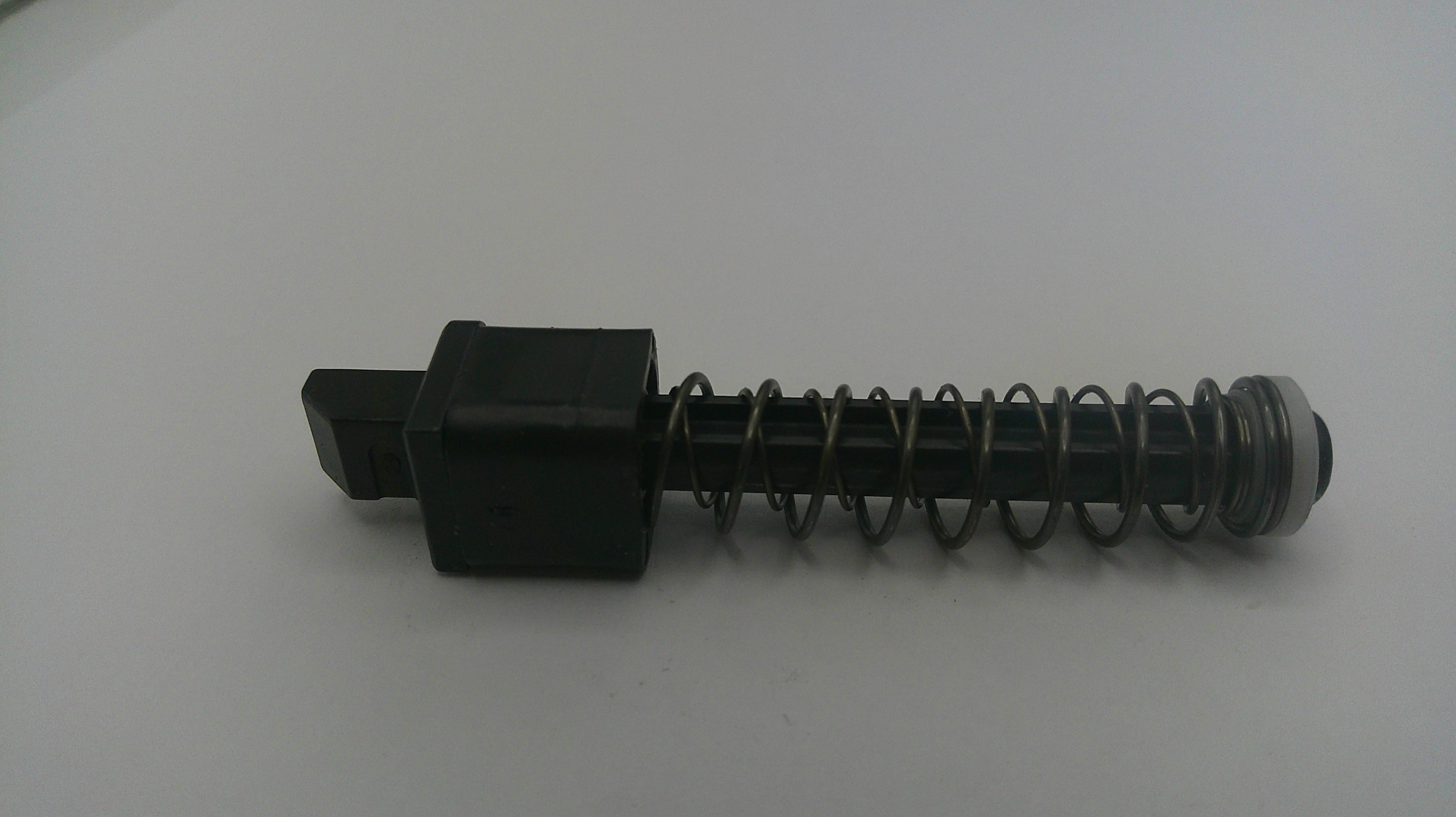 Mechanical component with a spring on a white background