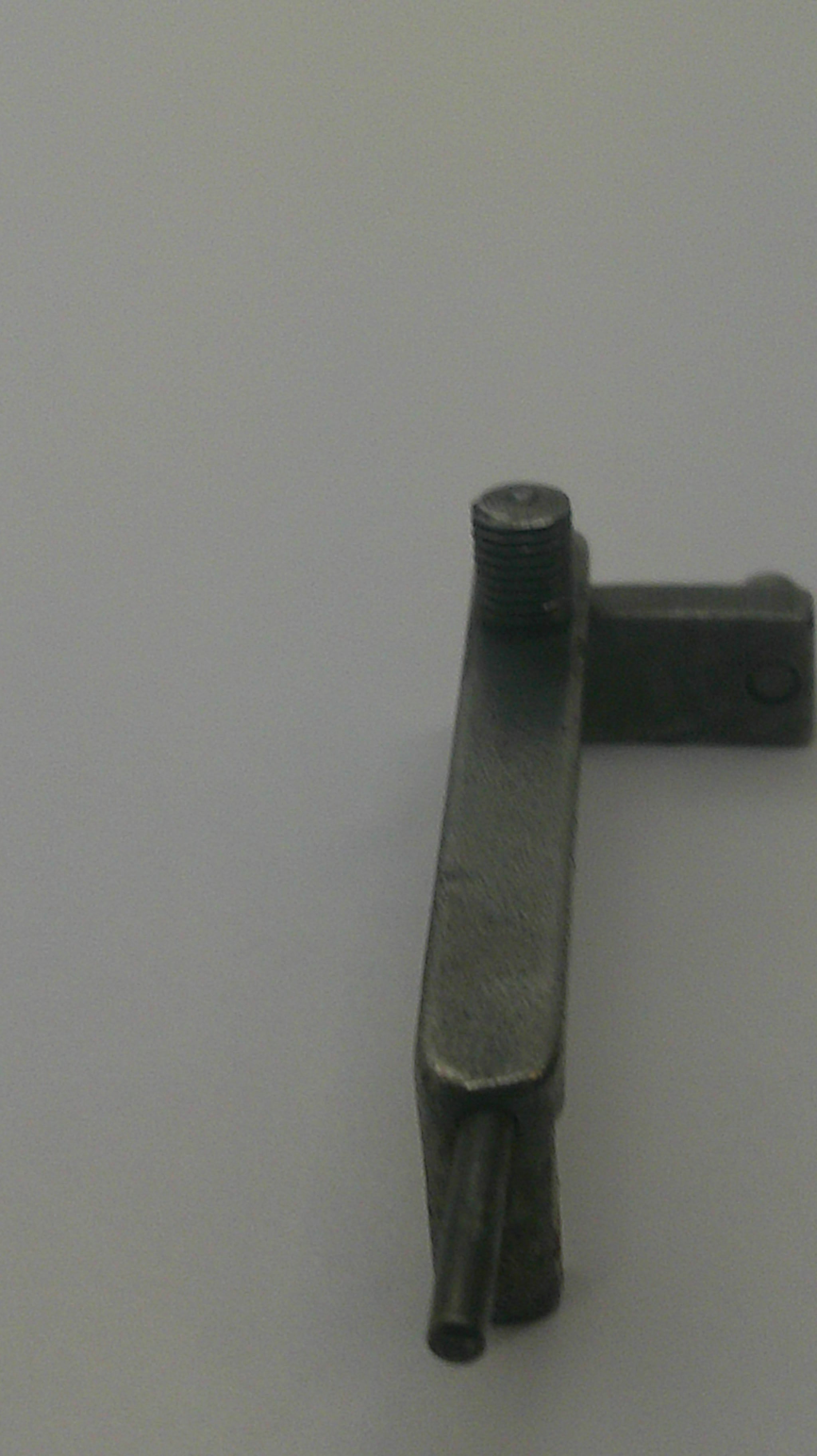 A small dark metal hardware piece with a flat rectangular bar, a threaded rod end, and a vertical mounting tab, shown against a plain light background.