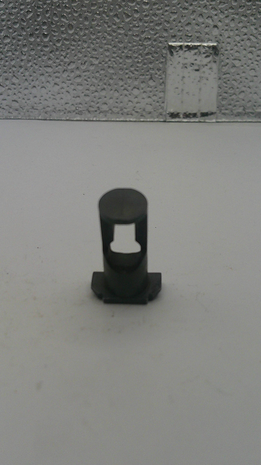 Metallic lock on a textured surface