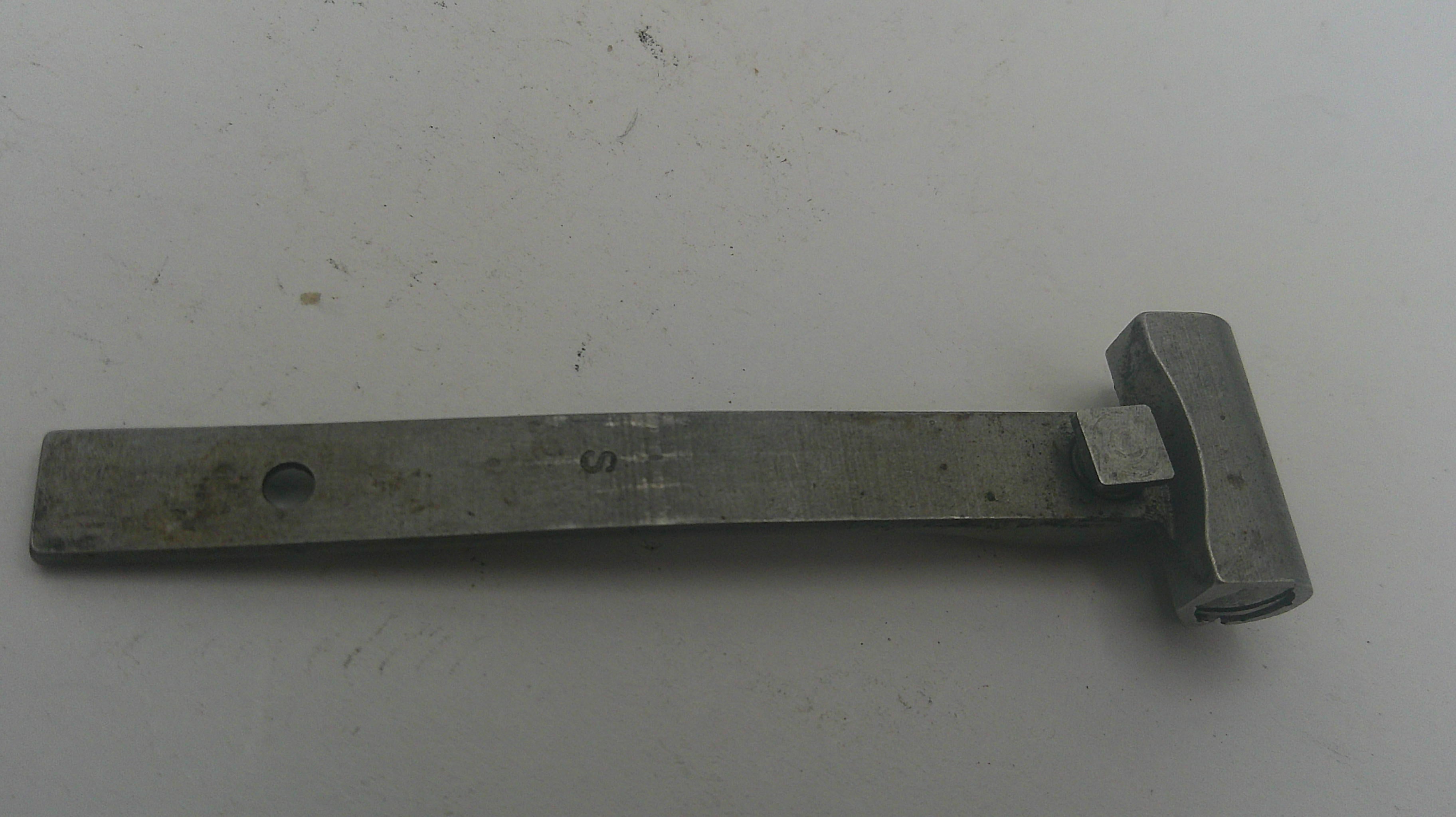 Metal tool on a white background
