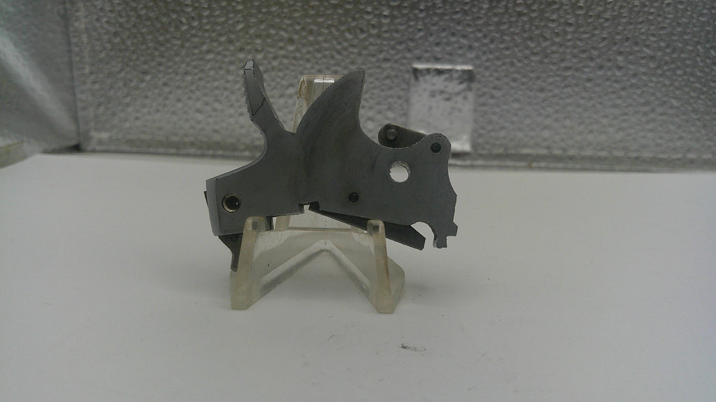 Metallic tool on a stand with a metallic background