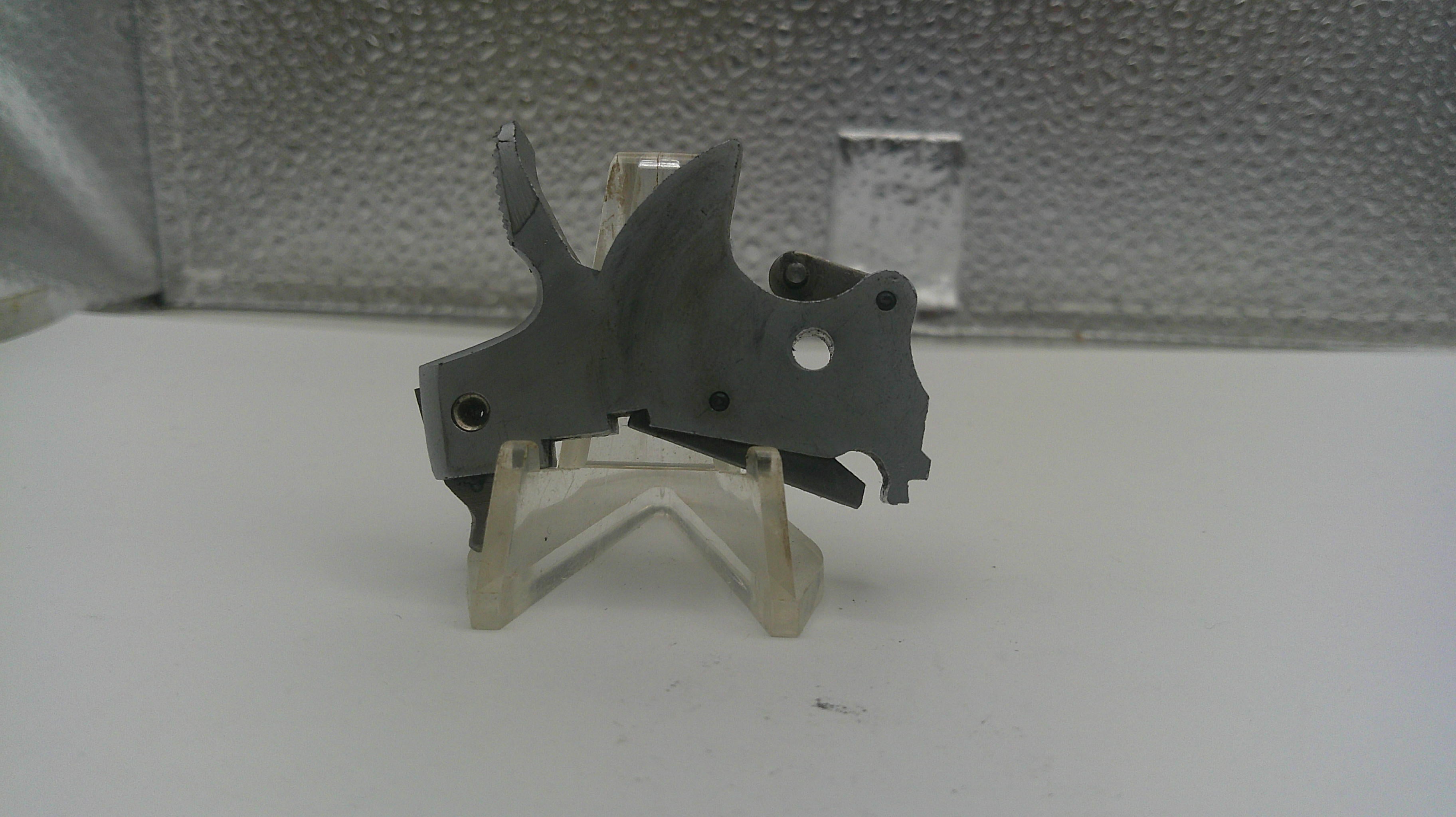 Metallic tool on a stand with a metallic background