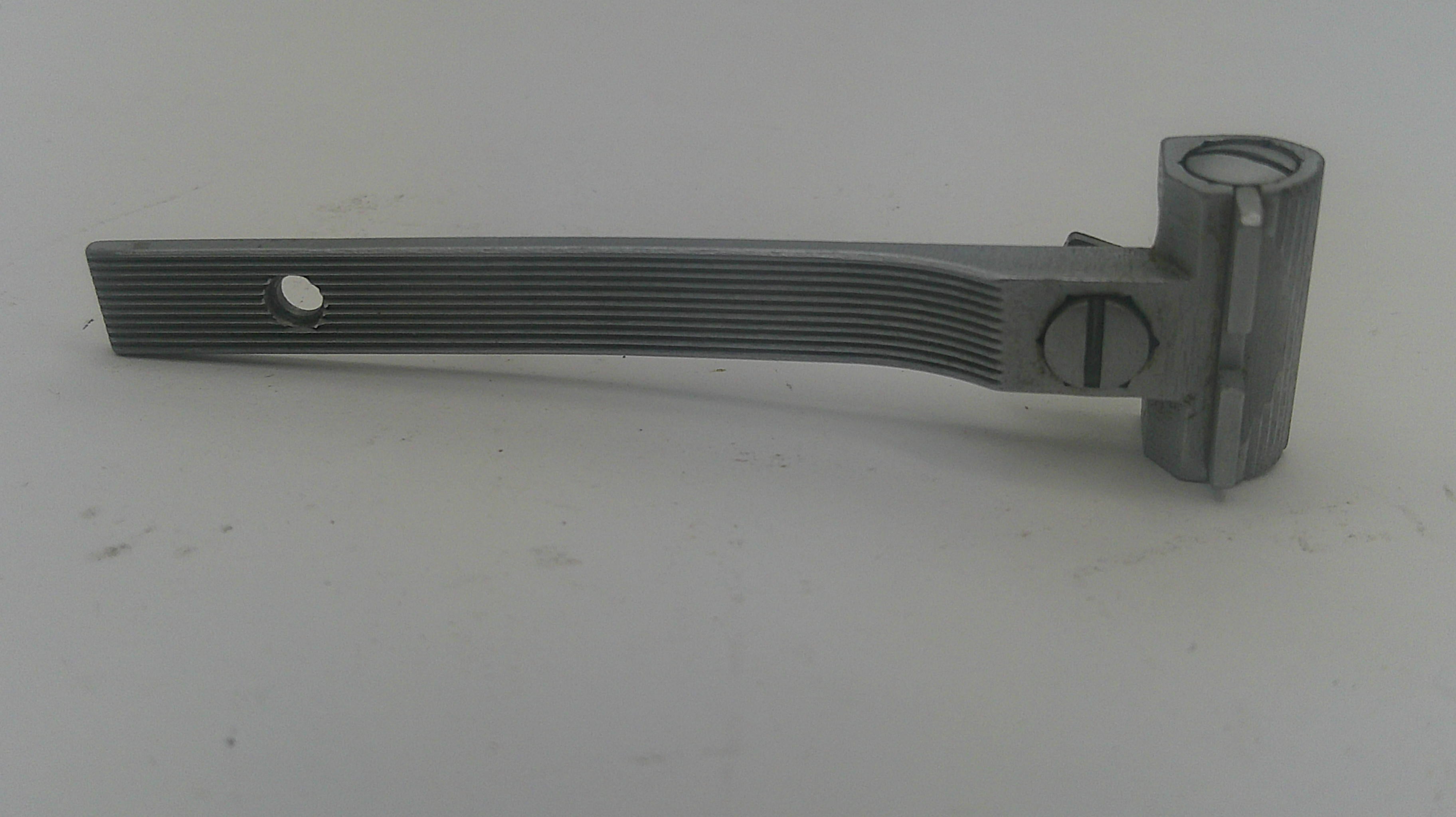 A dark gray metal door handle lever with a ribbed grip and a mounting bracket, shown on a plain light gray background.