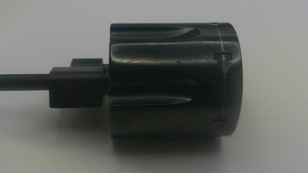 Black cylindrical object with a cable on a white background