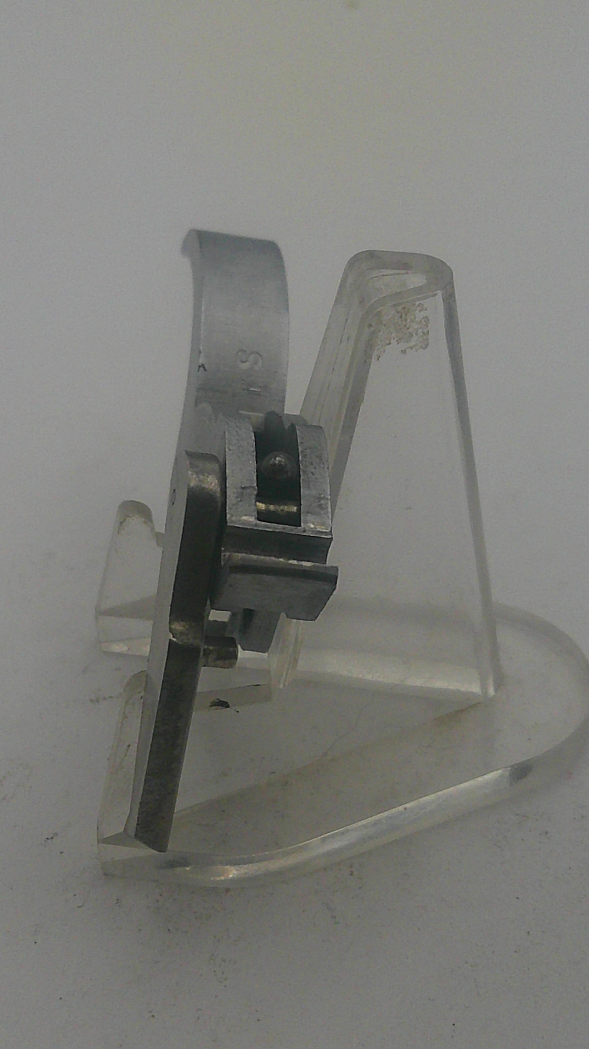 Metallic clip on a white background