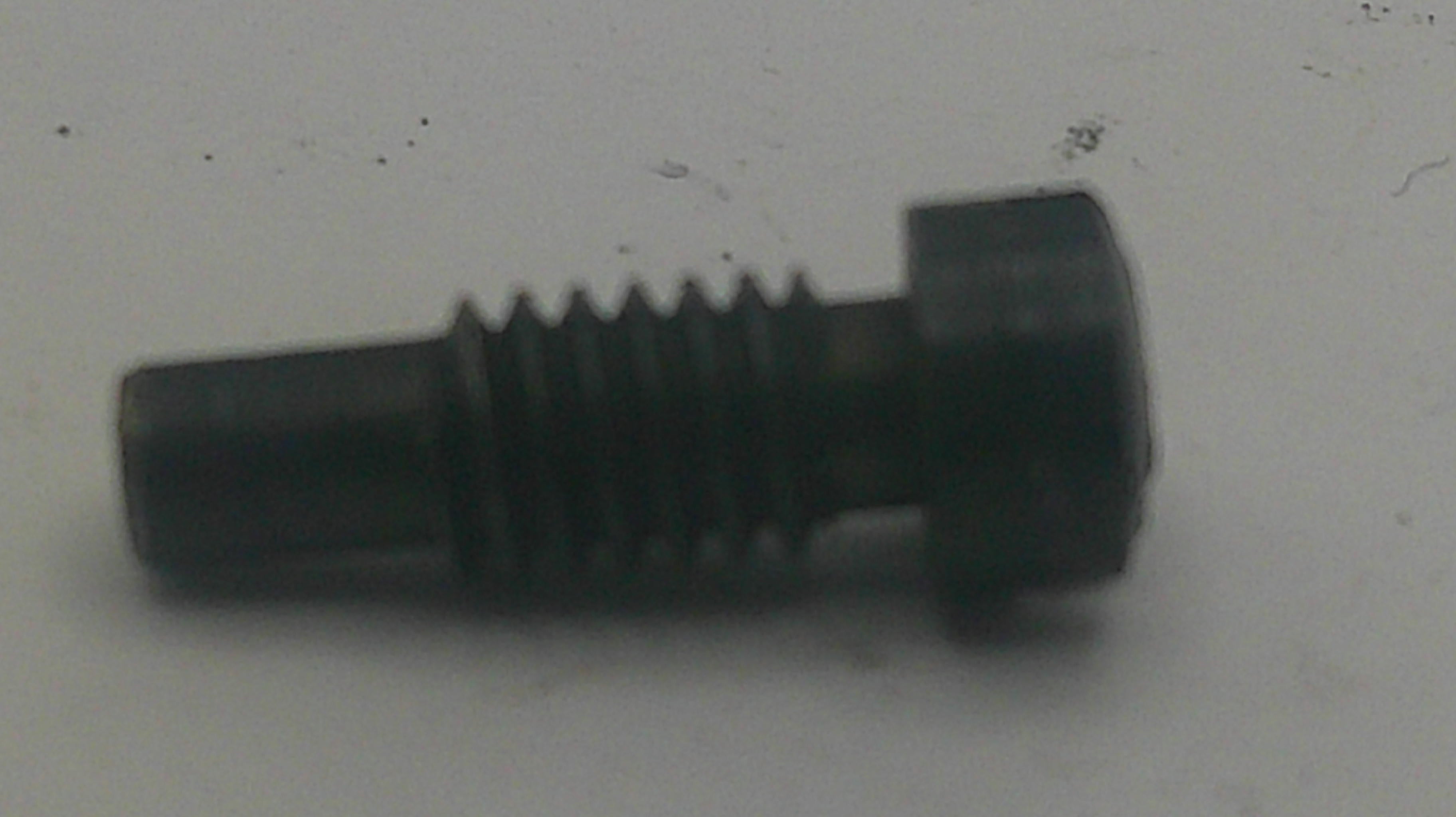 A small black metal threaded screw or bolt with a hex head, shown on a plain light background.