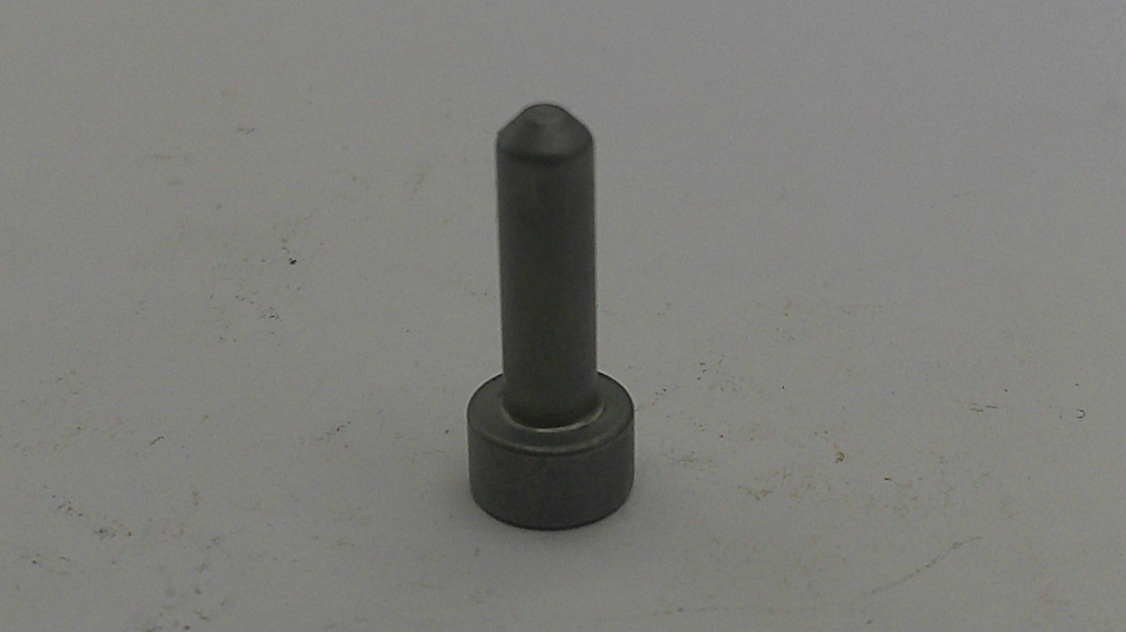 Metal cylindrical object on a light gray background